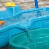 image:imageStep 2 Spill amp Splash Seaway Water Table for Kids TwoTier Outdoor Kids Water Sensory Table with Umbrella Ages 15 Years Old 11 Piece Water Toy AccessoriesMulticolor