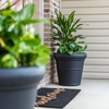 image:imageStep2 Claremont Tall Round Planter Large Planters for Outdoor Plants Gardening and Flower Pot for Patio or Porch Efficient Drainage Durable Plastic Dark Cedar 2PackOnyx Black